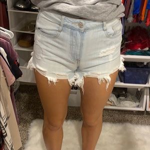 Light washed jean shorts.